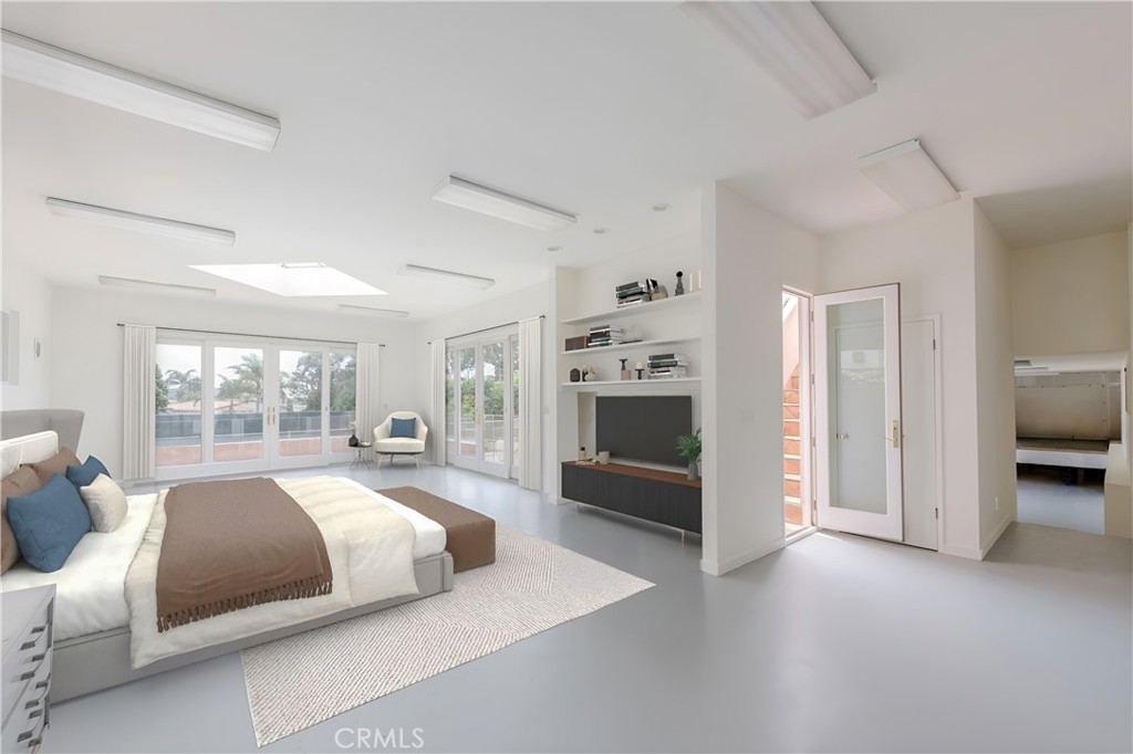 1166 Longfellow Drive Manhattan Beach, CA 90266 - Photo 31 of 47 a spacious bedroom with a large bed and a couch