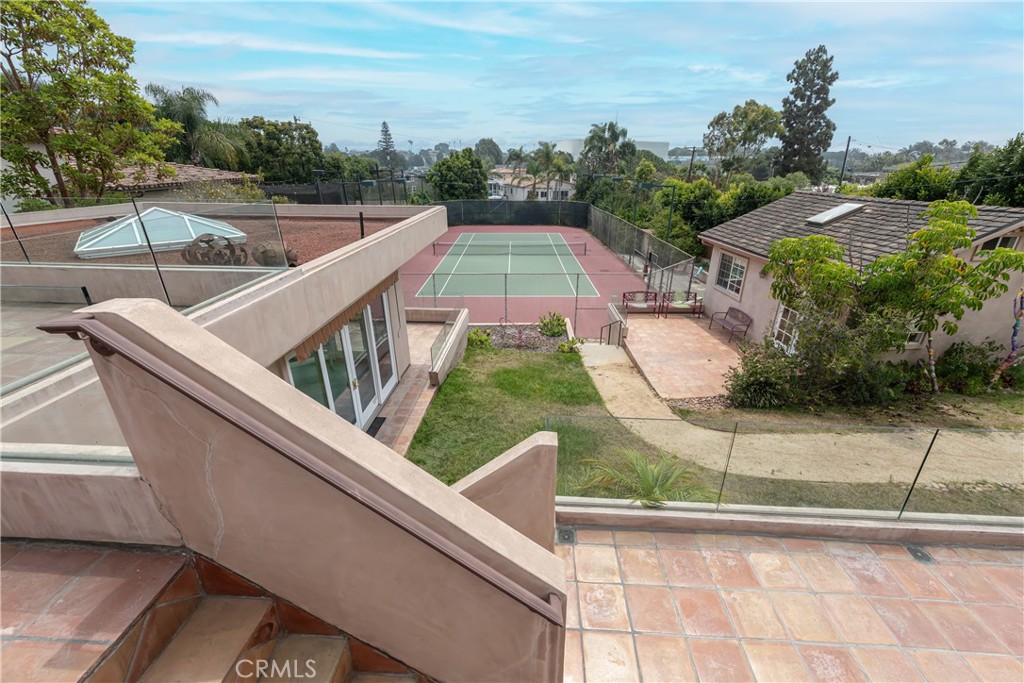 1166 Longfellow Drive Manhattan Beach, CA 90266 - Photo 32 of 47 a view of a balcony with floor to ceiling windows