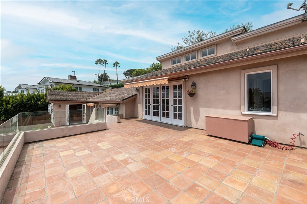 1166 Longfellow Drive Manhattan Beach, CA 90266 - Photo 34 of 47 a front view of a house with a yard