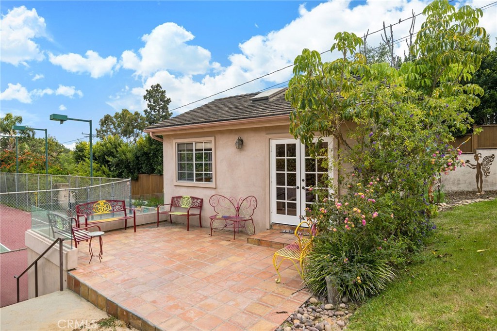 1166 Longfellow Drive Manhattan Beach, CA 90266 - Photo 37 of 47 a backyard of a house with outdoor seating