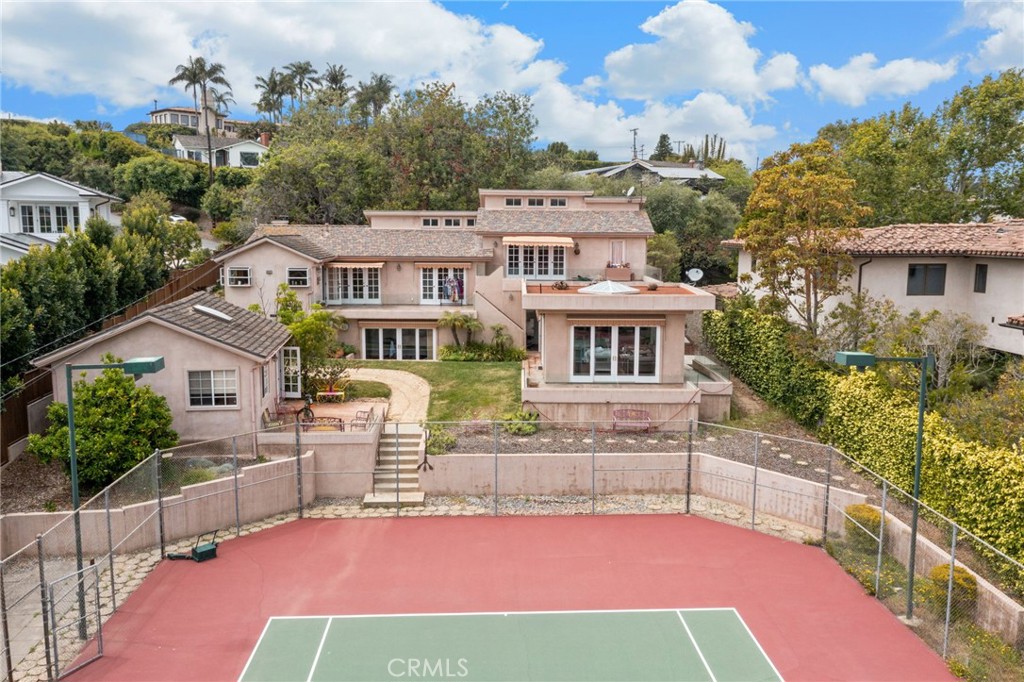 1166 Longfellow Drive Manhattan Beach, CA 90266 - Photo 5 of 47 a view of a house with a swimming pool and a chairs