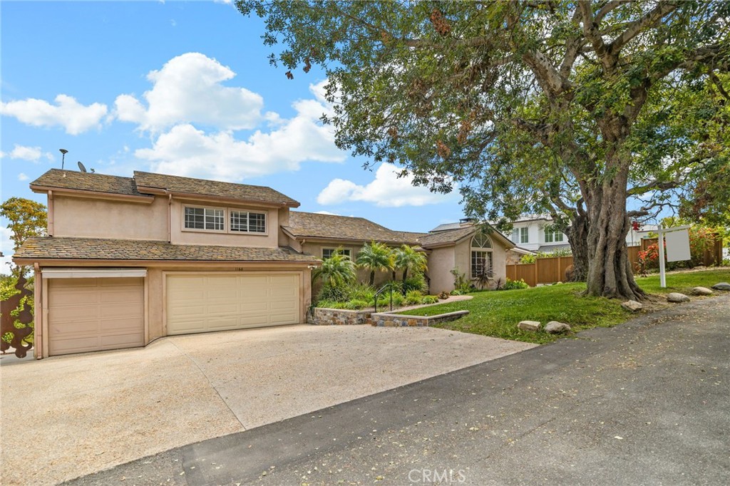1166 Longfellow Drive Manhattan Beach, CA 90266 - Photo 8 of 47 front view of a house with a street