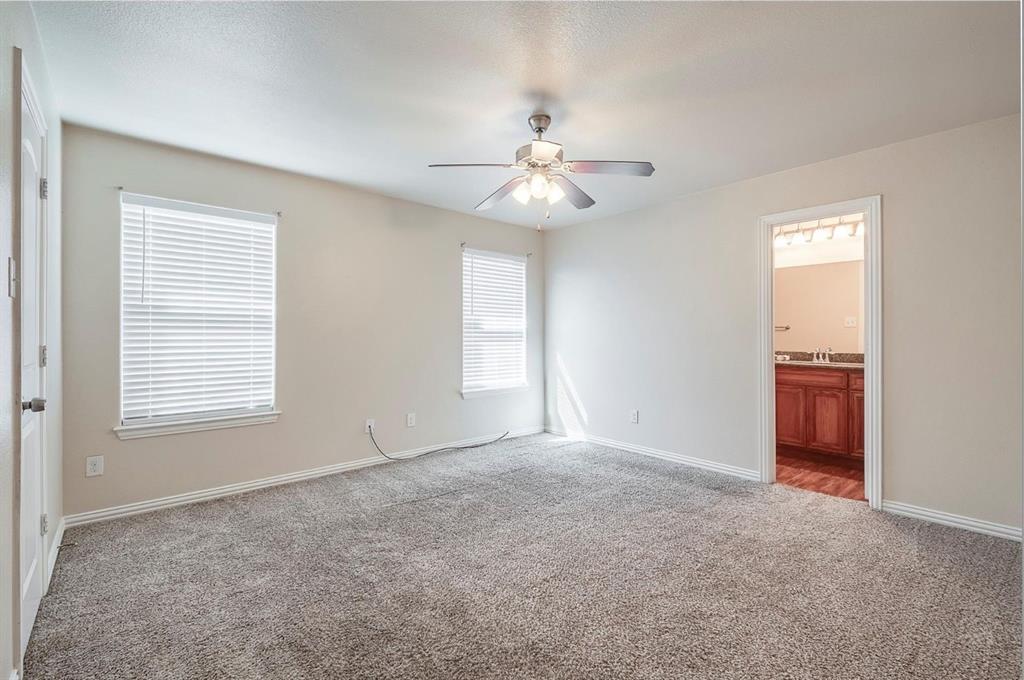 452 Canvas Court Crowley, TX 76036 - Photo 9 of 11 a view of an empty room with a window
