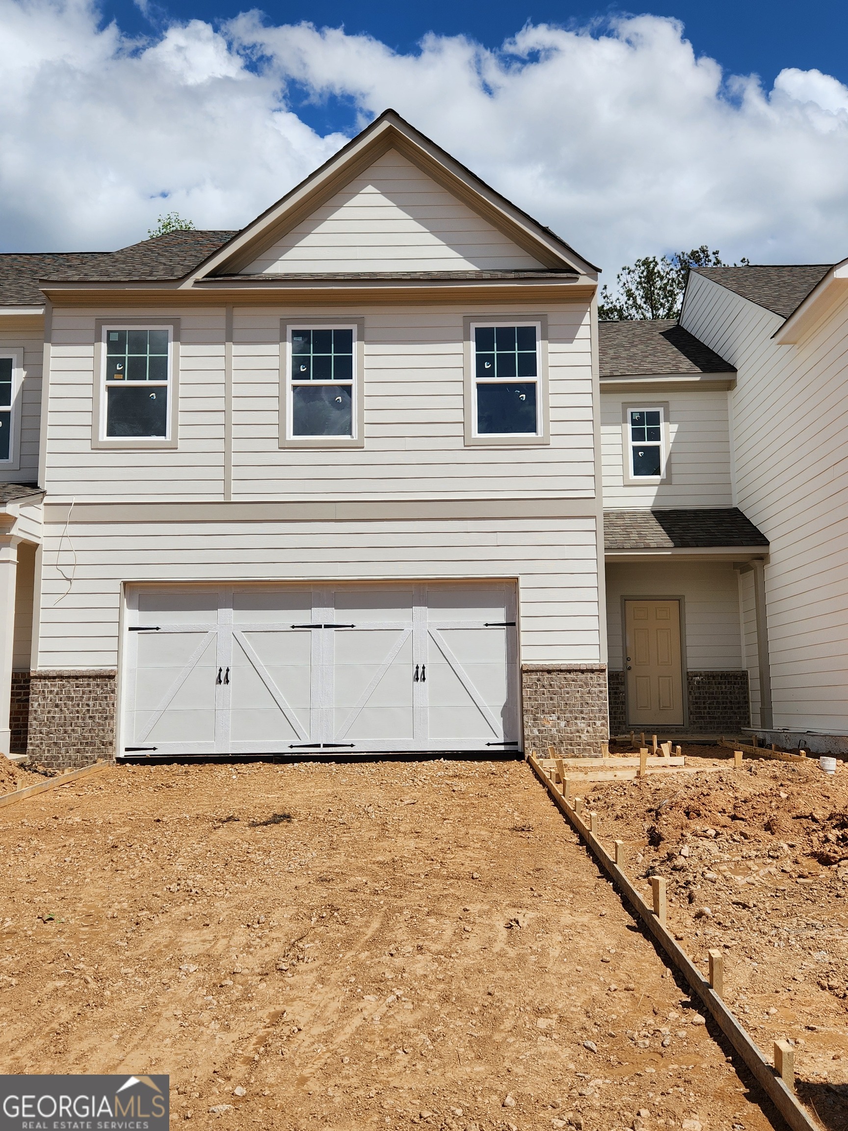 36 Russet Way Newnan, GA 30263 - Photo 1 of 30 a front view of a house with a yard