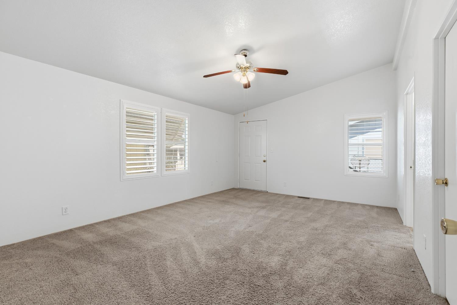 2113 Barrington Lane Modesto, CA 95350 - Photo 15 of 32 a view of an empty room with a window