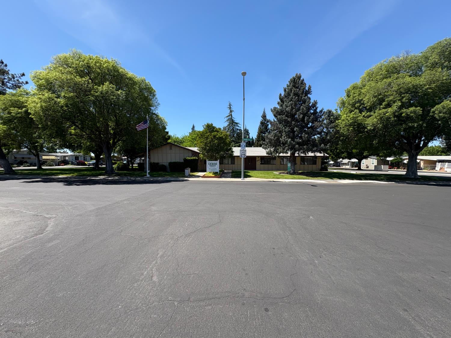 2113 Barrington Lane Modesto, CA 95350 - Photo 23 of 32 a view of road with a cars parked in front of it