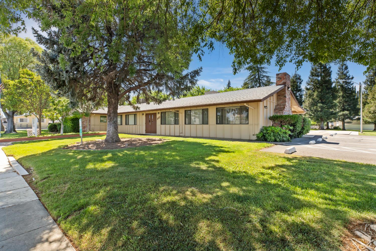2113 Barrington Lane Modesto, CA 95350 - Photo 25 of 32 a view of a house with a swimming pool