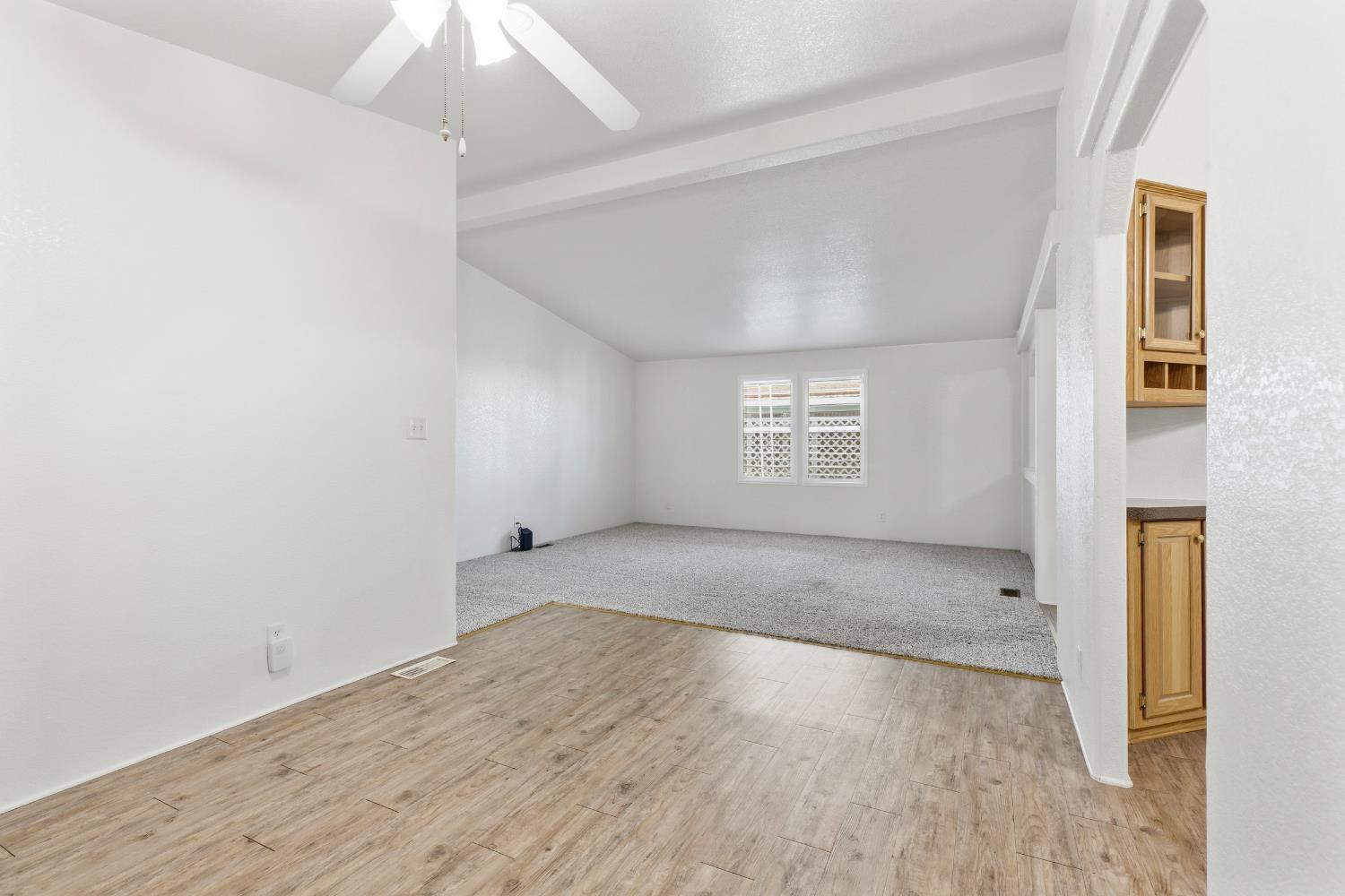 2113 Barrington Lane Modesto, CA 95350 - Photo 10 of 32 an empty room with a empty space and windows