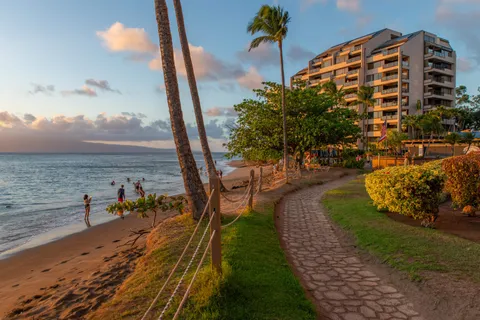 a view of a swimming pool with an ocean view