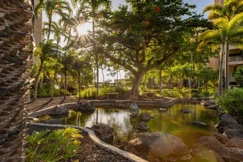 a view of water body with boats and trees