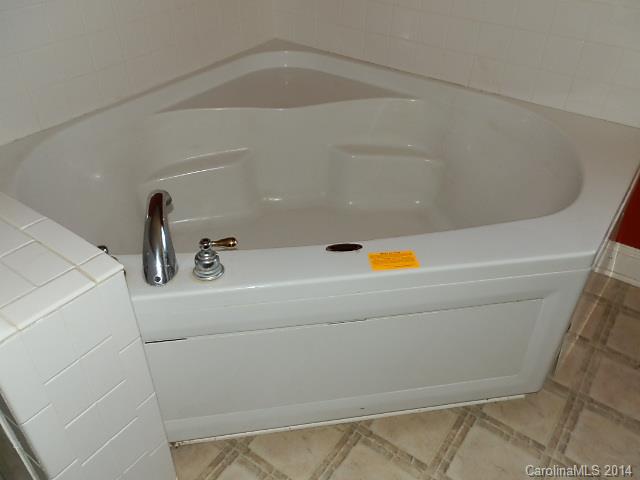 700 Mt Vernon Road Woodleaf, NC 27054 - Photo 14 of 24 a bathroom with a shower and toilet