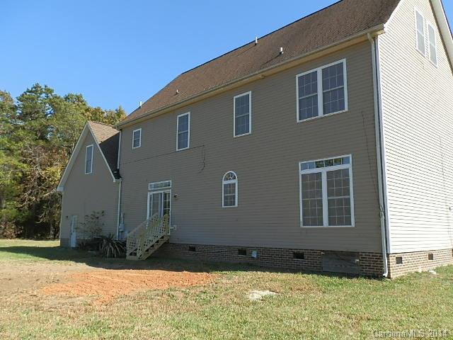 700 Mt Vernon Road Woodleaf, NC 27054 - Photo 3 of 24 a house view with a backyard space