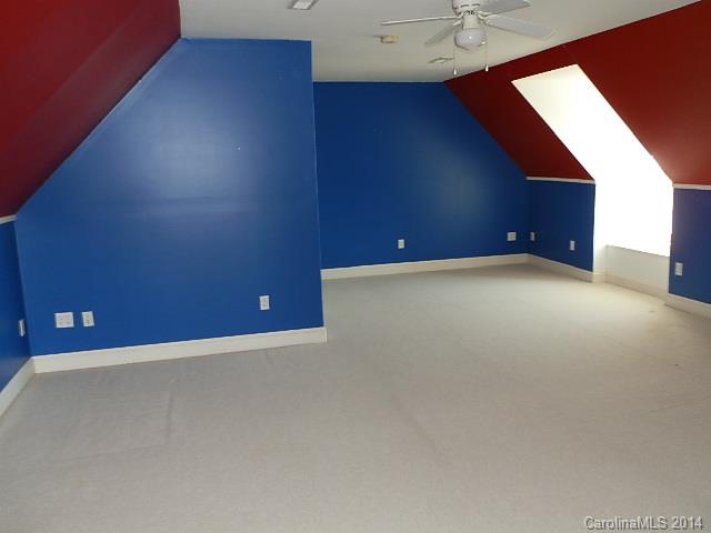 700 Mt Vernon Road Woodleaf, NC 27054 - Photo 7 of 24 a view of an empty room