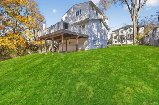 a view of a house with a big yard