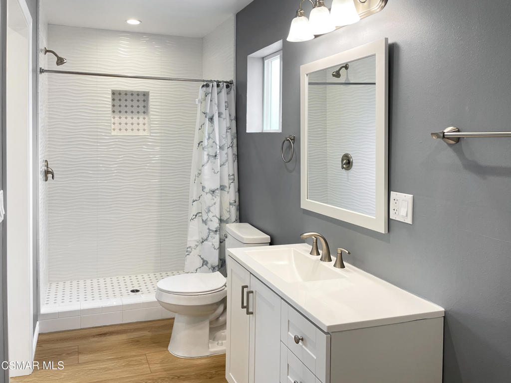 2142 Heywood Street, Unit A Simi Valley, CA 93065 - Photo 10 of 14 a bathroom with a sink toilet and shower