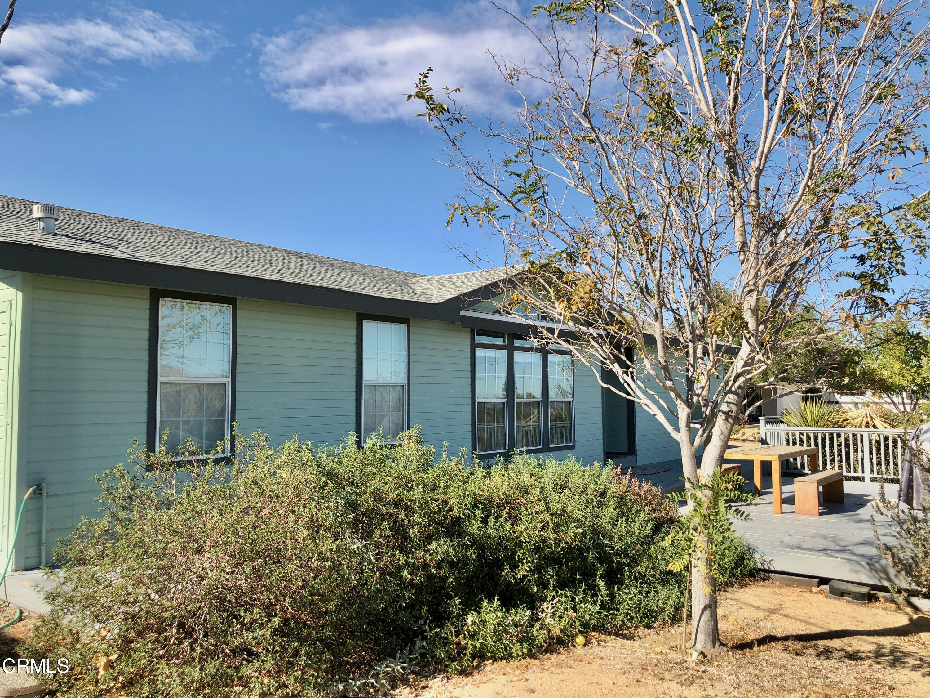 7354 Quail Springs Road Joshua Tree, CA 92252 - Photo 2 of 56 front view of a house with a yard