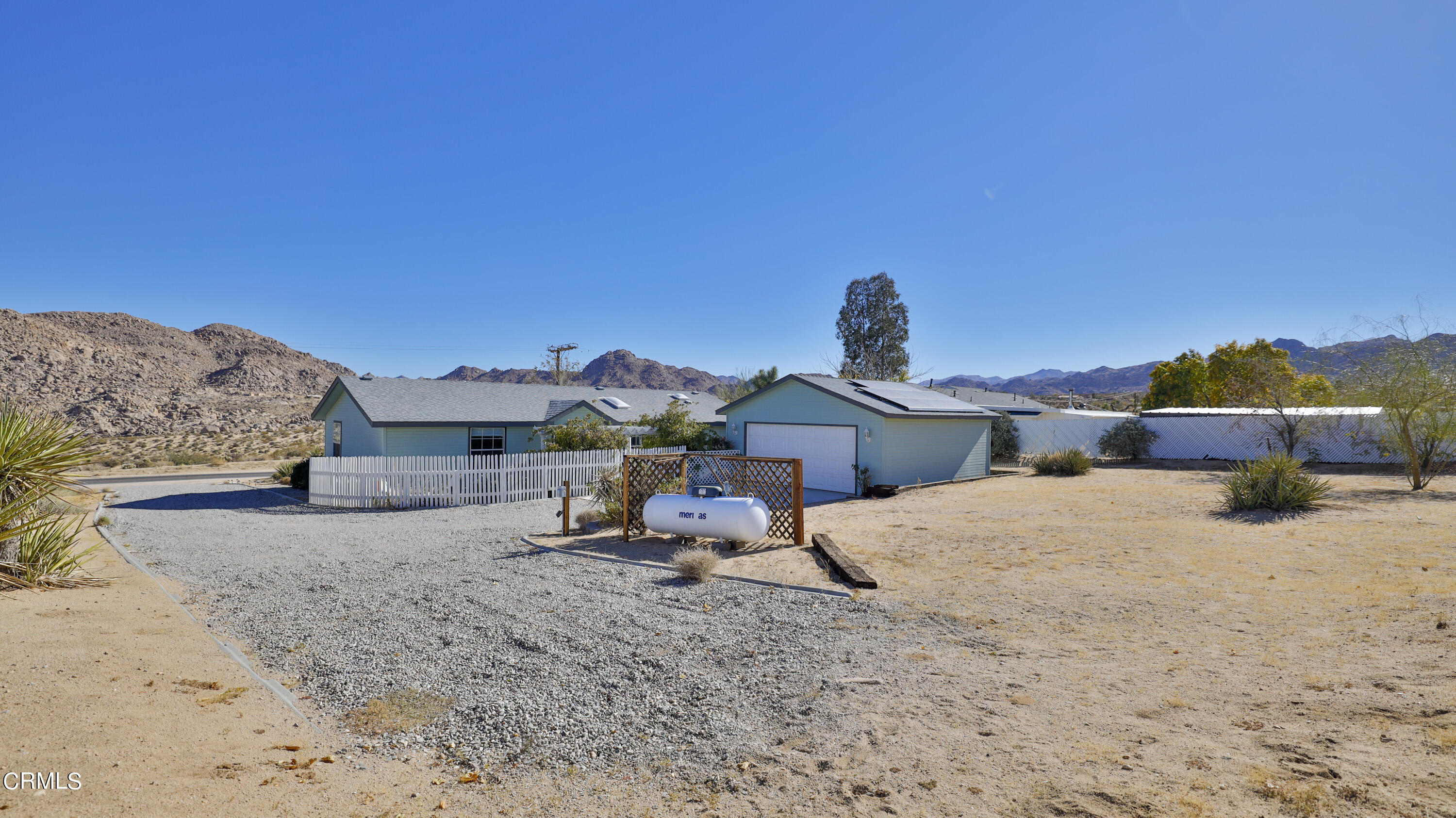 7354 Quail Springs Road Joshua Tree, CA 92252 - Photo 39 of 56 a dirt road with flat screen tv