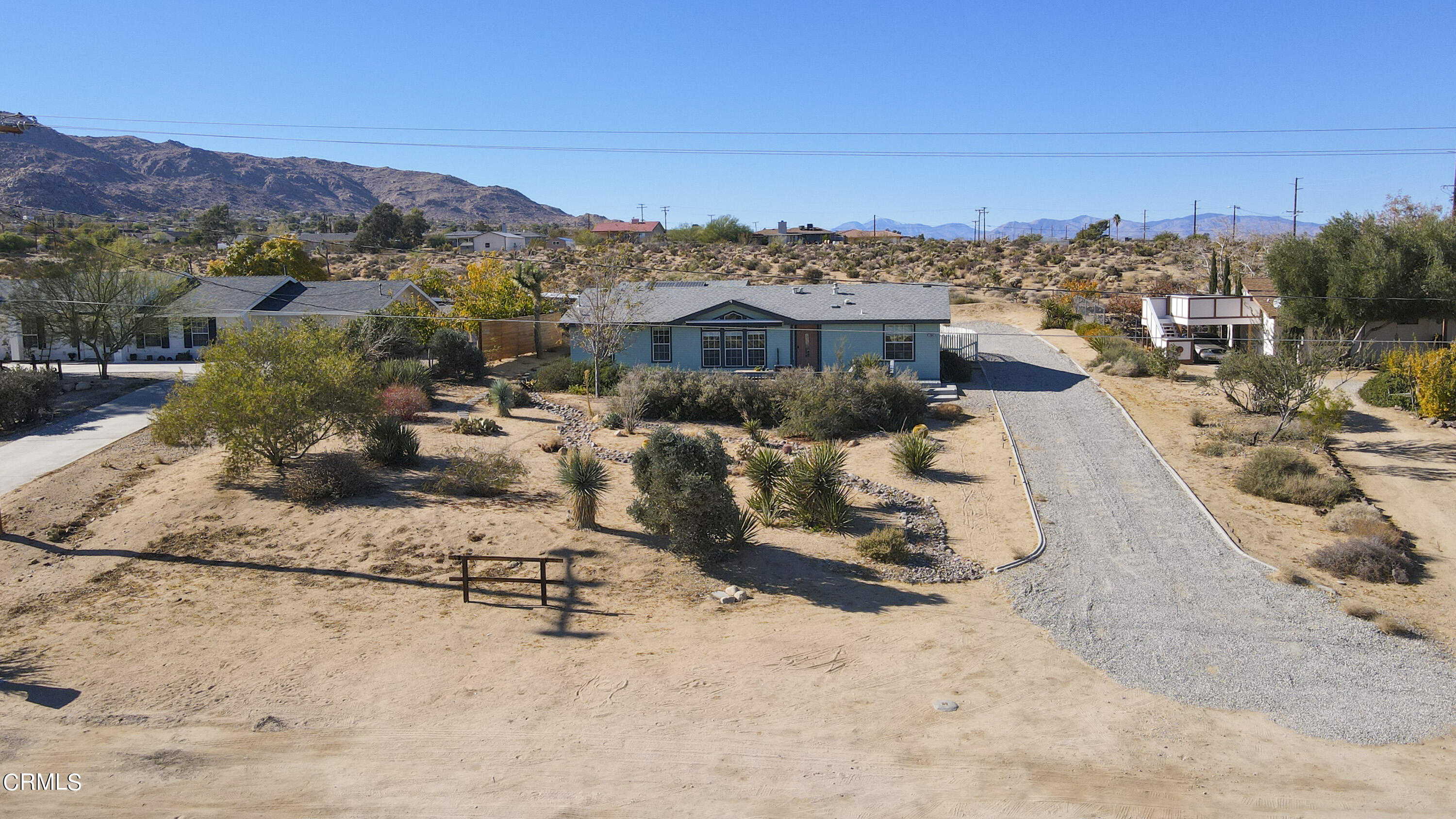 7354 Quail Springs Road Joshua Tree, CA 92252 - Photo 44 of 56 a view of a terrace with a backyard