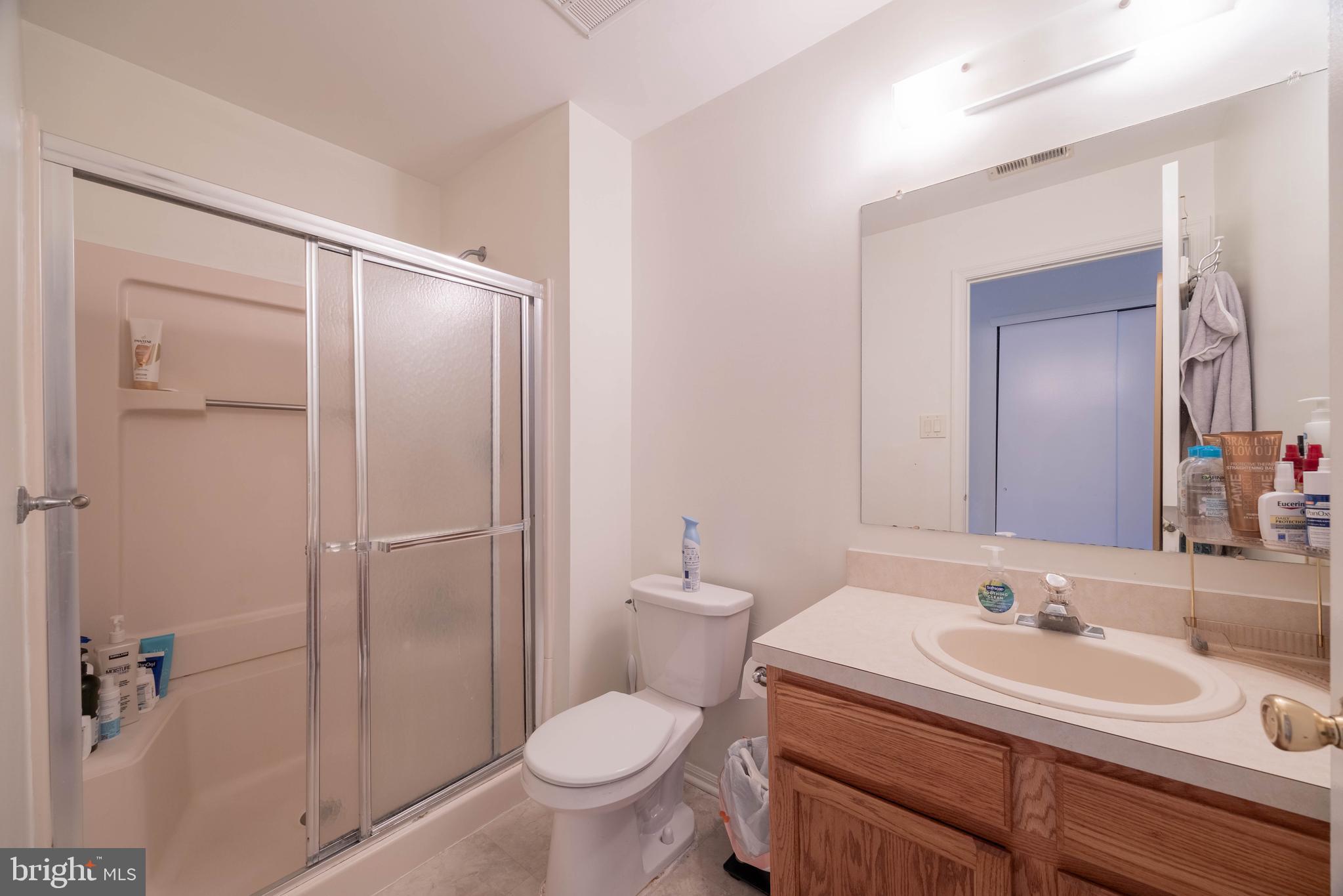 905 Rabbit Run Road Marlton, NJ 08053 - Photo 16 of 20 a bathroom with a sink toilet and shower
