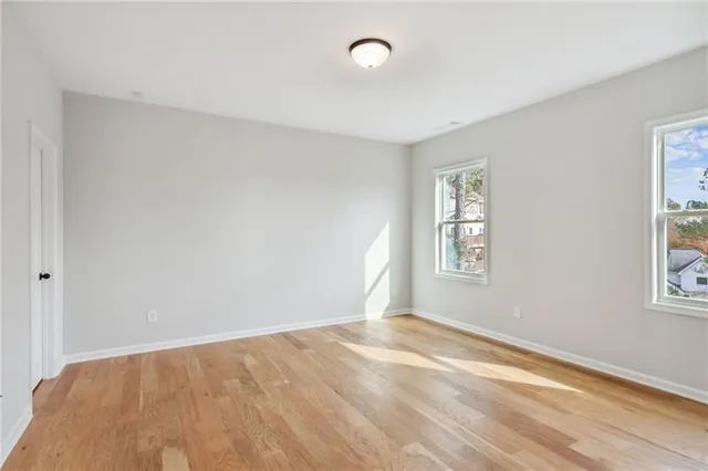 an empty room with windows