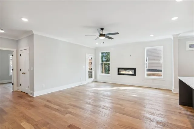 a view of an empty room with a window