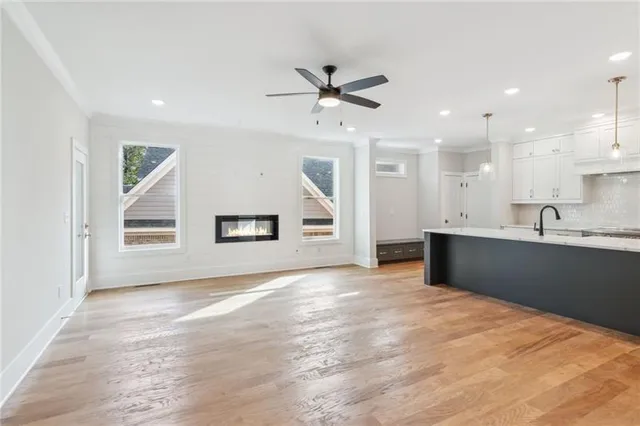 a view of a kitchen with a sink and cabinet