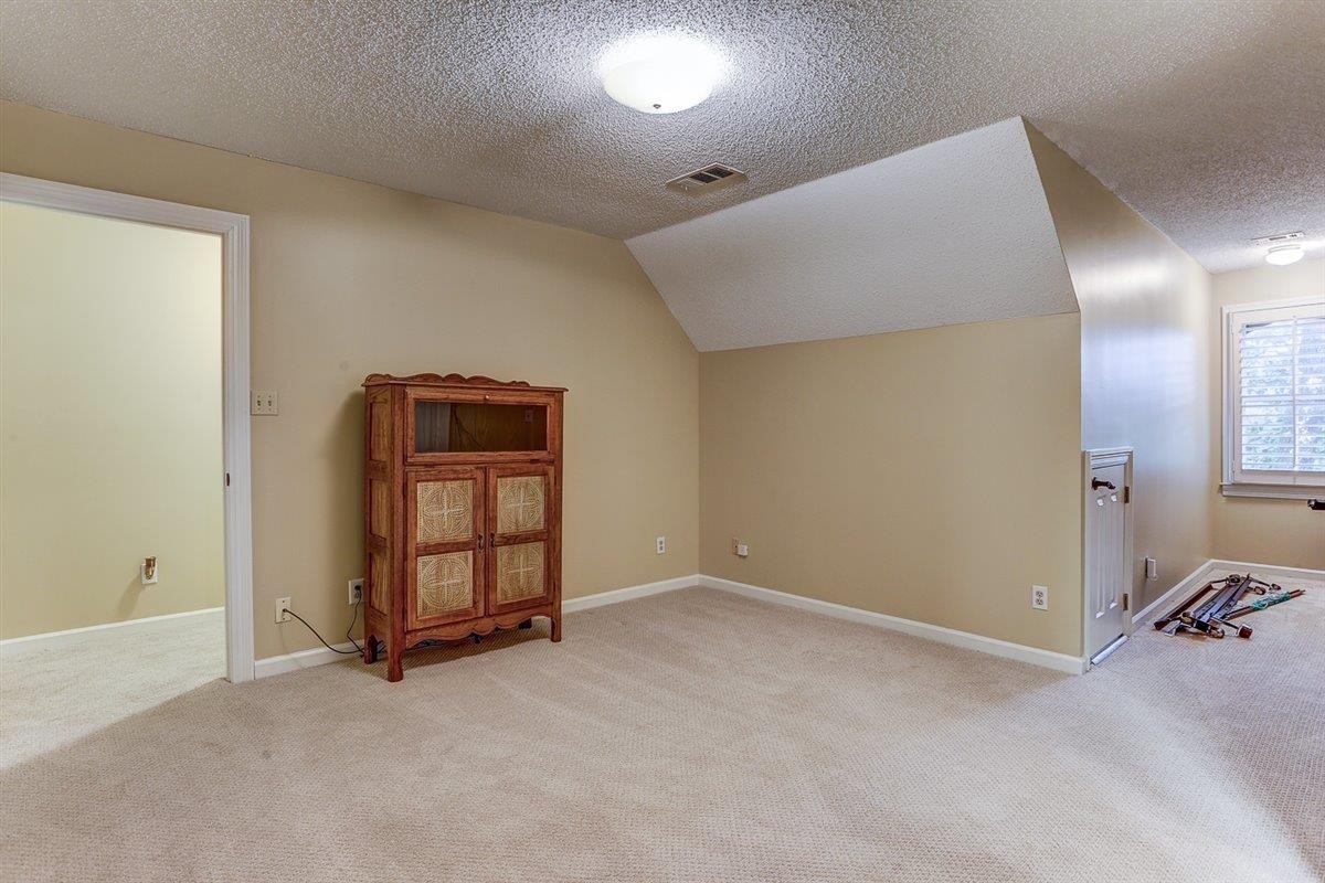 6648 Rue Beaumonde Drive Memphis, TN 38120 - Photo 16 of 20 a view of an empty room with a window