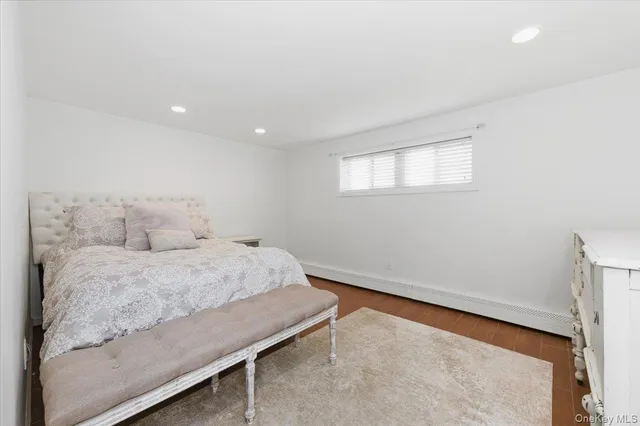 a room with a bed and a window