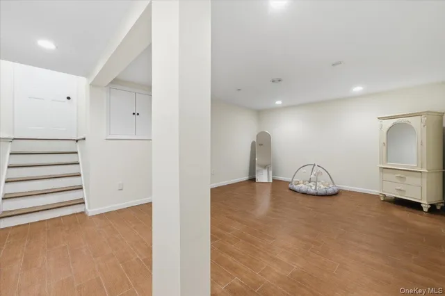 a view of a livingroom with wooden floor