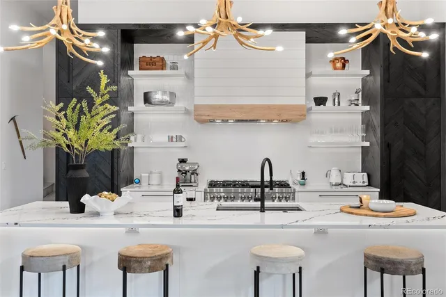 a kitchen with a sink and a refrigerator