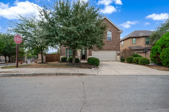 a view of a house with a street
