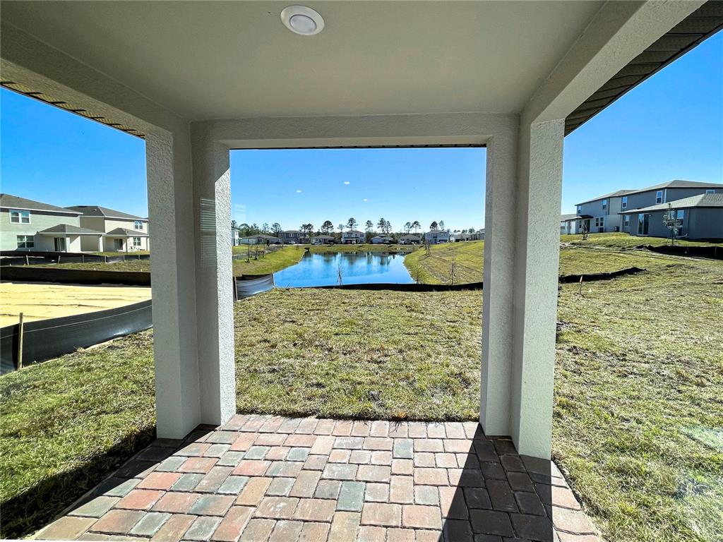 902 Rivers Crossing Street Clermont, FL 34714 - Photo 19 of 26 a view of a balcony dining table and chairs