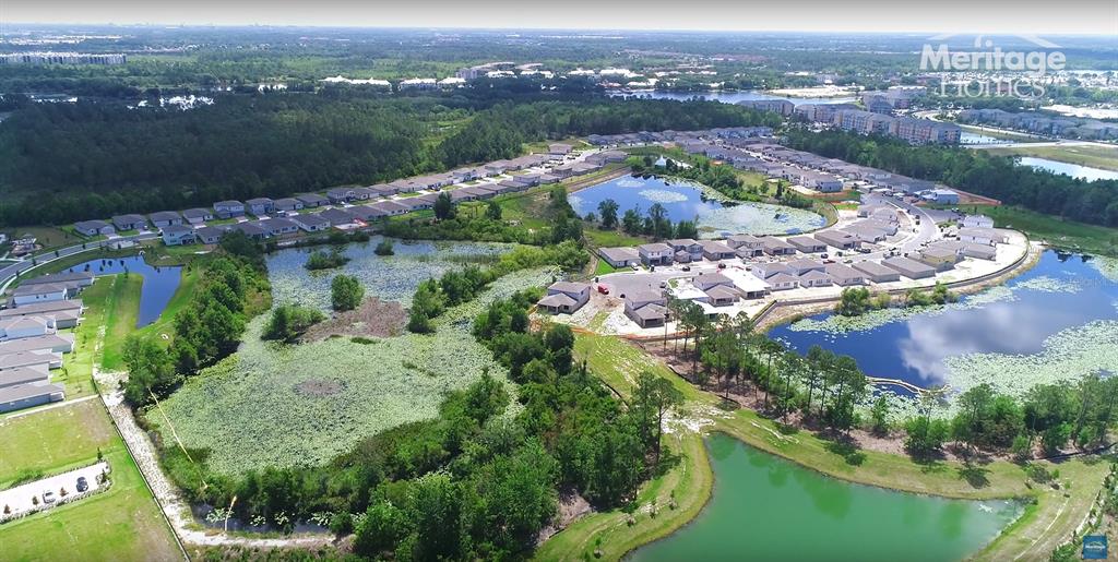 902 Rivers Crossing Street Clermont, FL 34714 - Photo 24 of 26 an aerial view of a house with a lake view