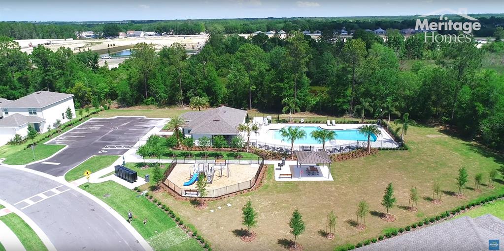 902 Rivers Crossing Street Clermont, FL 34714 - Photo 25 of 26 an aerial view of a house with yard swimming pool and outdoor seating