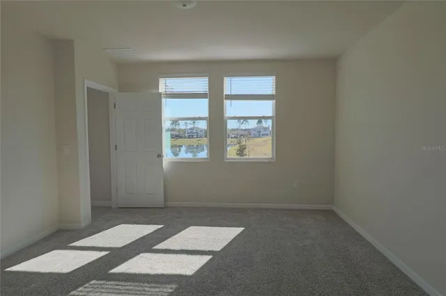 an empty room with windows