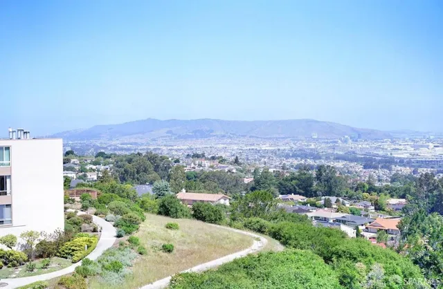a view of a terrace with a garden