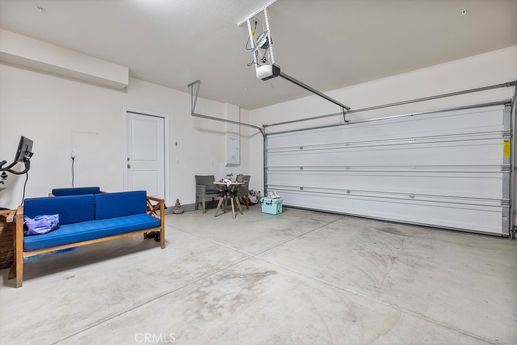 2522 Gunner Ridge Way Rialto, CA 92377 - Photo 23 of 40 a view of a livingroom with furniture and a ceiling fan