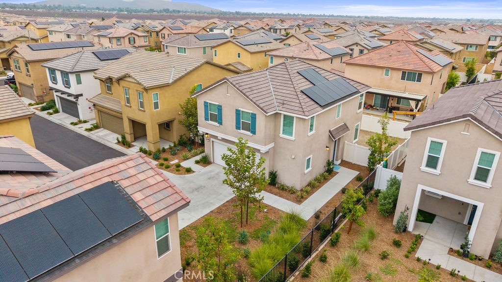 2522 Gunner Ridge Way Rialto, CA 92377 - Photo 26 of 40 an aerial view of a house with a swimming pool