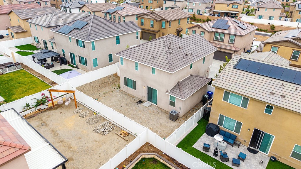 2522 Gunner Ridge Way Rialto, CA 92377 - Photo 32 of 40 an aerial view of a house