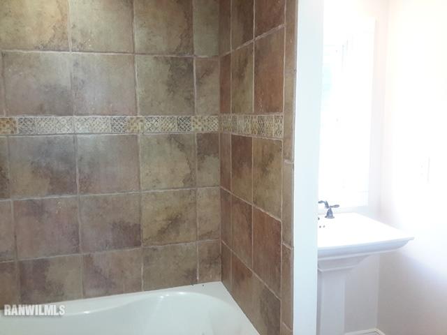 4422 Broadview Road Rockford, IL 61101 - Photo 11 of 25 a bathroom with a shower