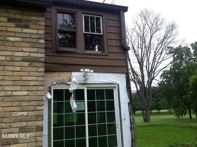 4422 Broadview Road Rockford, IL 61101 - Photo 15 of 25 a view of front door of house with outdoor space