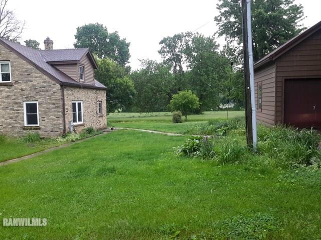 4422 Broadview Road Rockford, IL 61101 - Photo 20 of 25 a view of a house with a backyard
