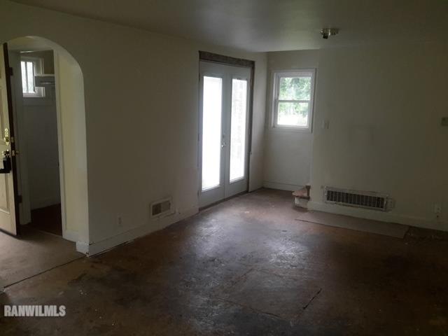 4422 Broadview Road Rockford, IL 61101 - Photo 2 of 25 an empty room with windows
