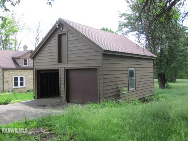 4422 Broadview Road Rockford, IL 61101 - Photo 21 of 25 a view of a house and a yard