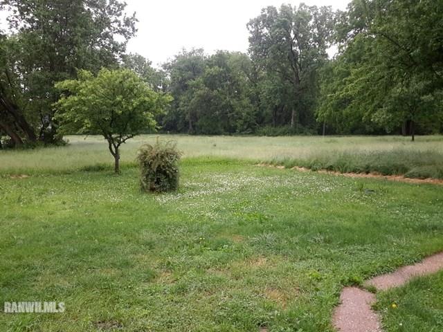 4422 Broadview Road Rockford, IL 61101 - Photo 23 of 25 a backyard of a house with lots of green space