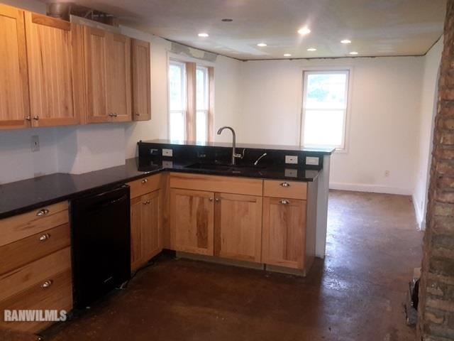 4422 Broadview Road Rockford, IL 61101 - Photo 5 of 25 a kitchen with stainless steel appliances granite countertop a sink stove and cabinets