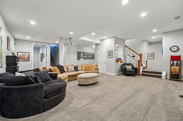 a living room with furniture and a couch