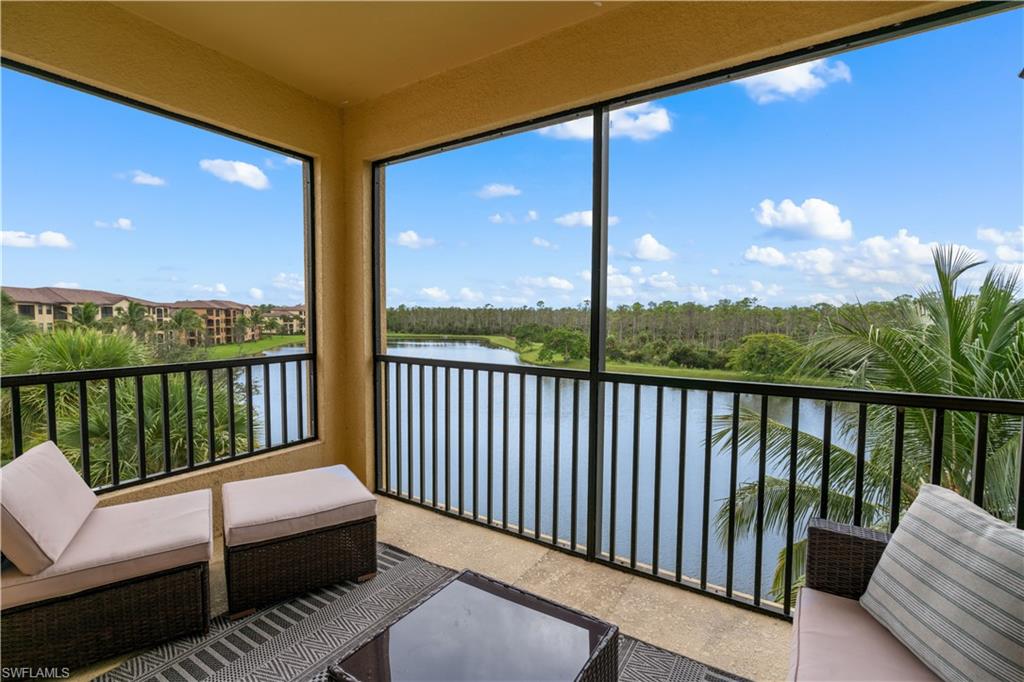 9735 Acqua Court, Unit 641 Naples, FL 34113 - Photo 1 of 34 a balcony with view of city from a balcony