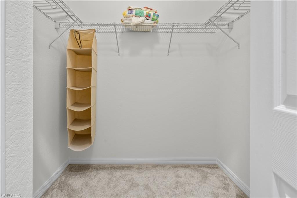9735 Acqua Court, Unit 641 Naples, FL 34113 - Photo 20 of 34 a view of walk in closet