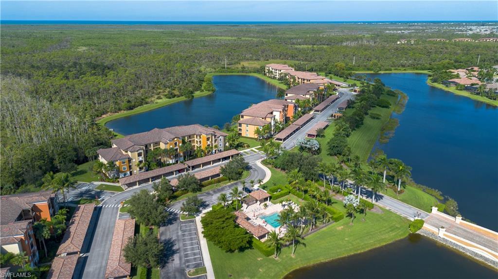 9735 Acqua Court, Unit 641 Naples, FL 34113 - Photo 25 of 34 an aerial view of a house with a garden view